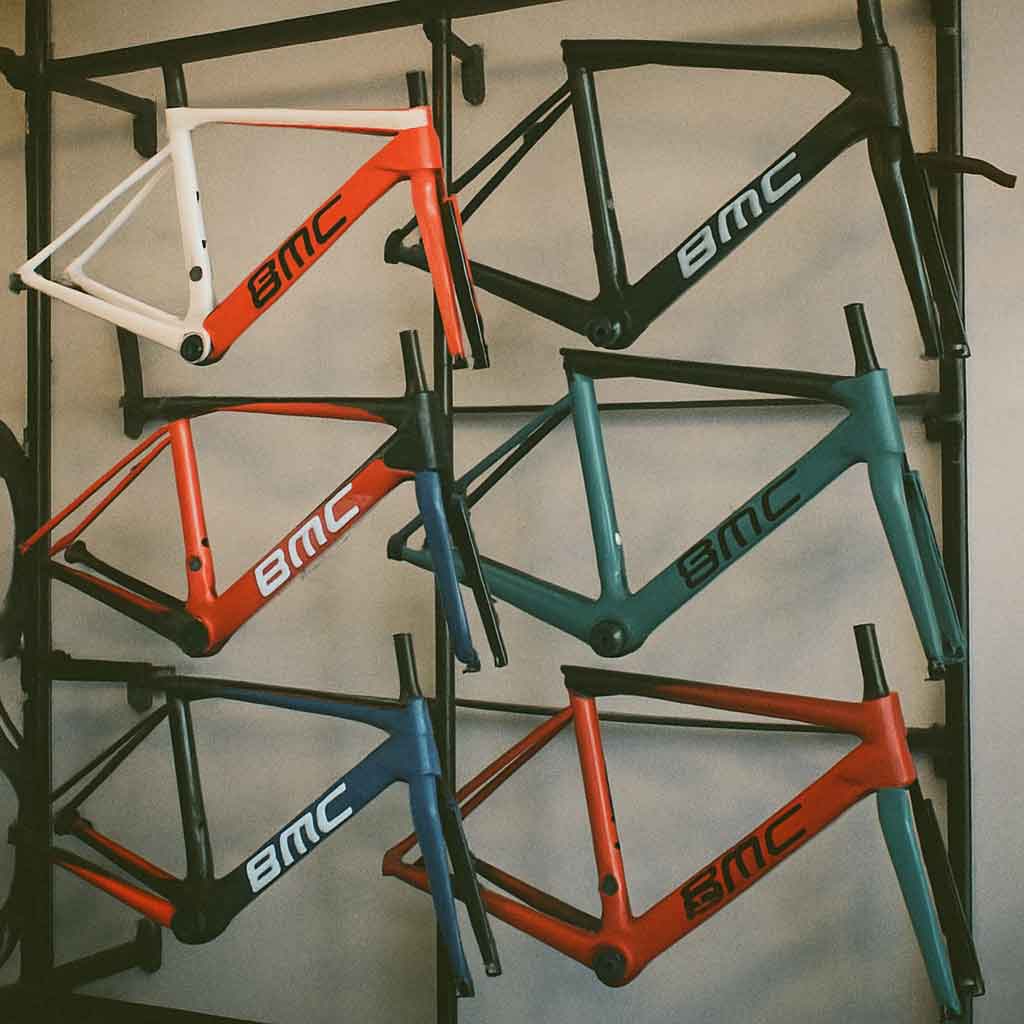 A variety of BMC bike frames displayed in a store