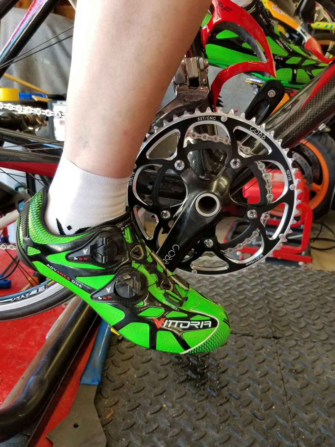 checking tire pressure on a mountain bike