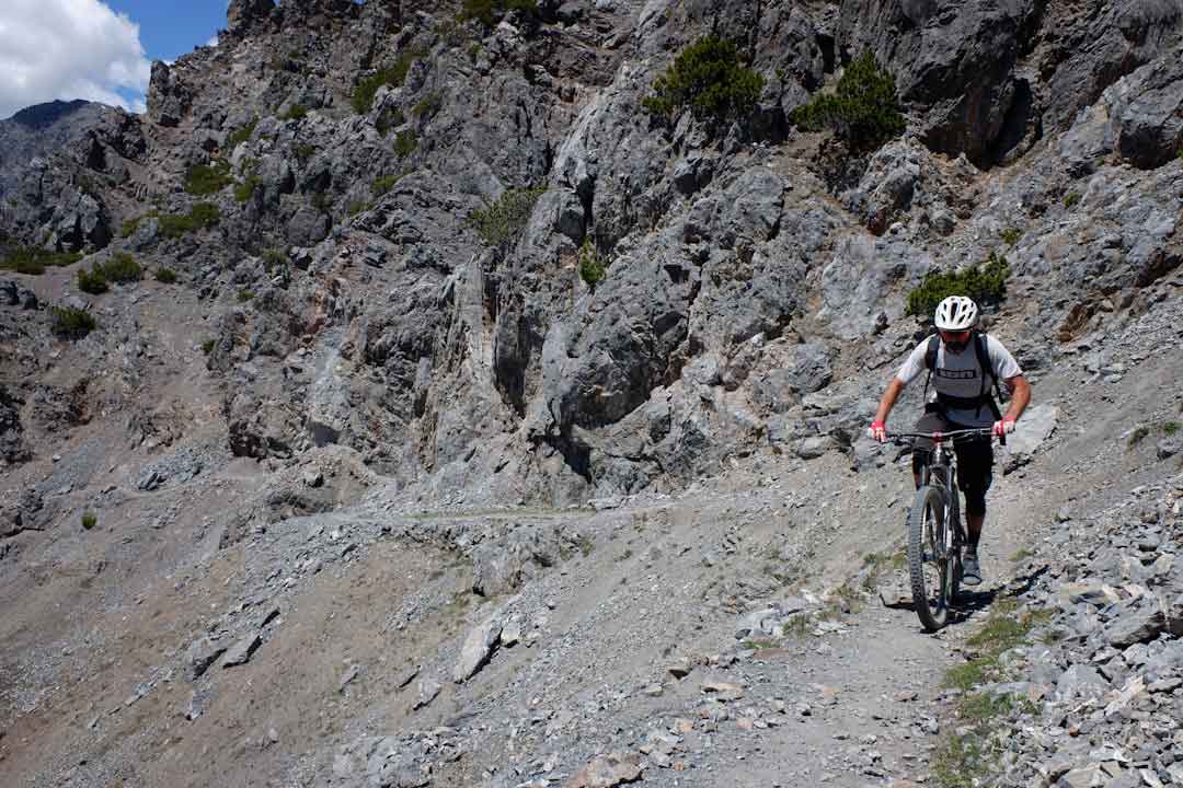 Mountain bike rider on rocky trail