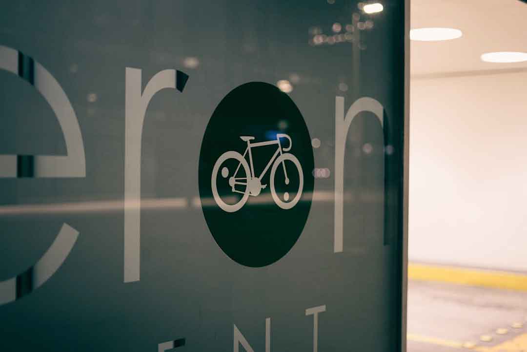 cyclist choosing a frame in a bike shop
